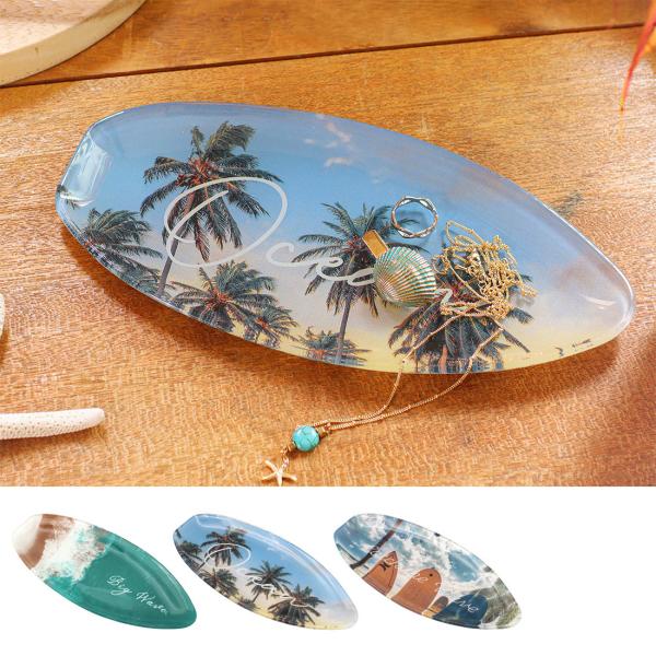 エモーショナルな写真と手書き風ロゴの組み合わせがおしゃれなプレート海やビーチサイドを感じさせる写真をガラスプレートにしました。アクセサリーや小物をのせて置いておくだけで、海を感じるインテリアに♪食器としてもお使いいただけます。※食器洗浄機、...