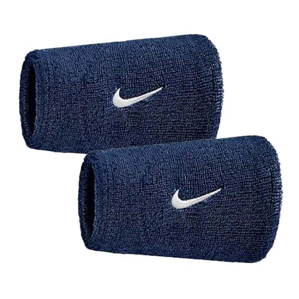 SPECカラー：カレッジネイビー×ホワイト(463)サイズ：フリー ※平置きサイズ：約7×12cm素材：綿73%、ナイロン23%、ポリエステル2%、ポリウレタン2%入数：同色2個組名称：Nike Swoosh Wristbands 2Pac...
