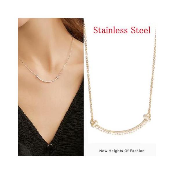 [Release date: December 20, 2025]■ヘッド幅42mm/チェーン約49cm■キュービックジルコニア■ステンレス製■イエローゴールド/ホワイト幸運を呼ぶT字スマイル、イエローゴールド＆ホワイト2色展開販売、お好み...