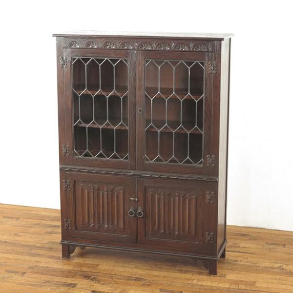 ブックケース ステンドグラスも魅力的な本棚 リネンフォールドの彫刻も可愛らしい 情熱セール 1940年頃イギリス 濃いめの落ち着いた色も魅力 収納棚
