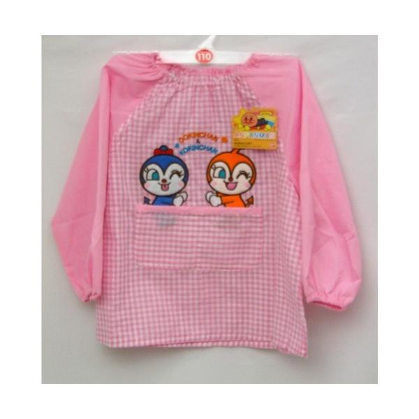 アンパンマン　スモック　ポケット付きカラー：ピンクサイズ：１００サイズ　胸囲　４９−５５cm　　　　１１０サイズ　胸囲　５３−５９cm素　材：チェック部分、綿１００％　　　　無地部分、ポリエステル９５％、綿５％　　　販売元：（株）バンダイ生...