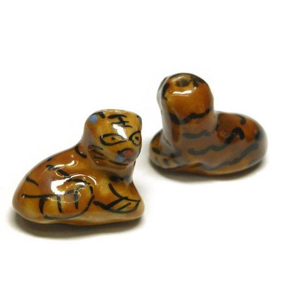 ◇陶器ビーズ◇トラ 虎 ブラウン 約19×21mm 約10粒 茶 06-1239