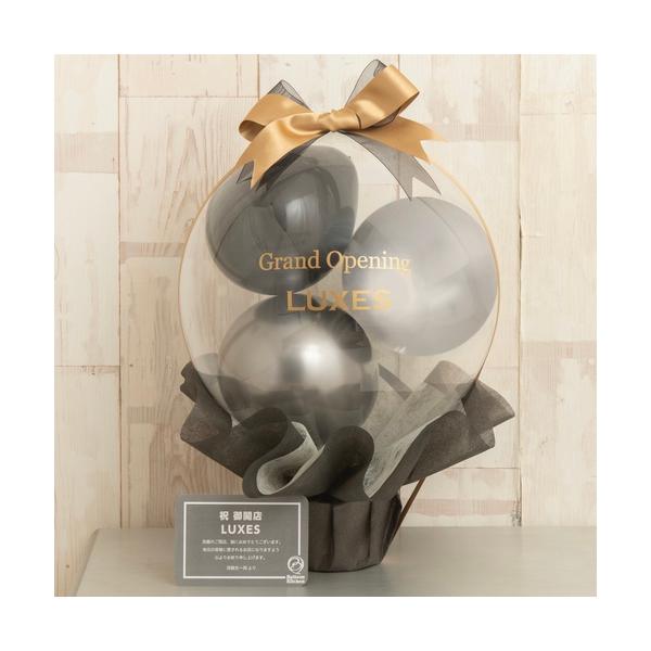 特別な瞬間や空間に、感動と幸せを添えて。ラウンドバルーンポットは、飾る場所を選ばない程よいサイズのデザインで、どんな空間にも調和します。主役であるクリアなバルーンの中には、質感の異なるブラックカラーのバルーンを使用し洗練された落ち着きを演出...