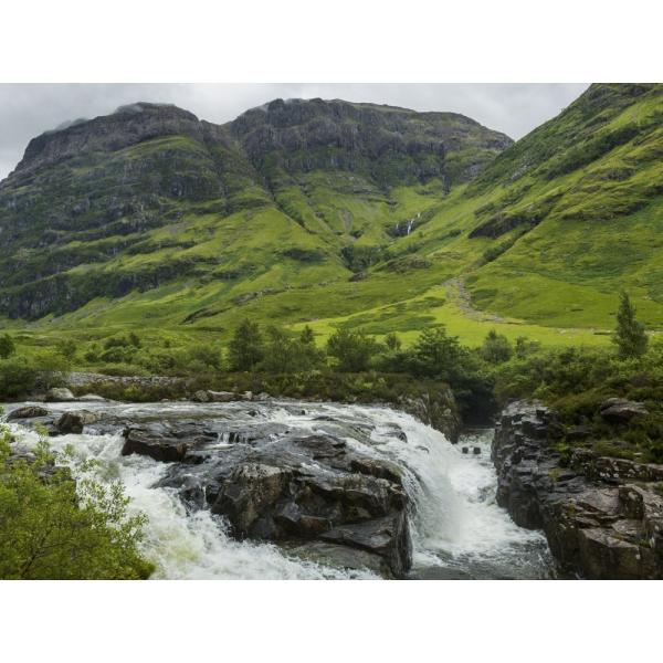 Water in a river rushing over rocks and lush grass in the hills Scotland Poster Print (17 x 13)