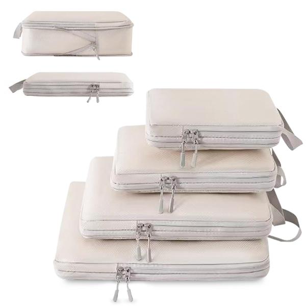 【商品説明】荷物をすっきりまとめる圧縮収納ポーチ4点セット（ベージュ）。圧縮ファスナー付きで衣類のかさを減らし、スーツケースのスペースを有効活用できます。S・M・L・XLの4サイズ入りで、Tシャツ・インナー・アウター・タオルなど用途に合わせ...