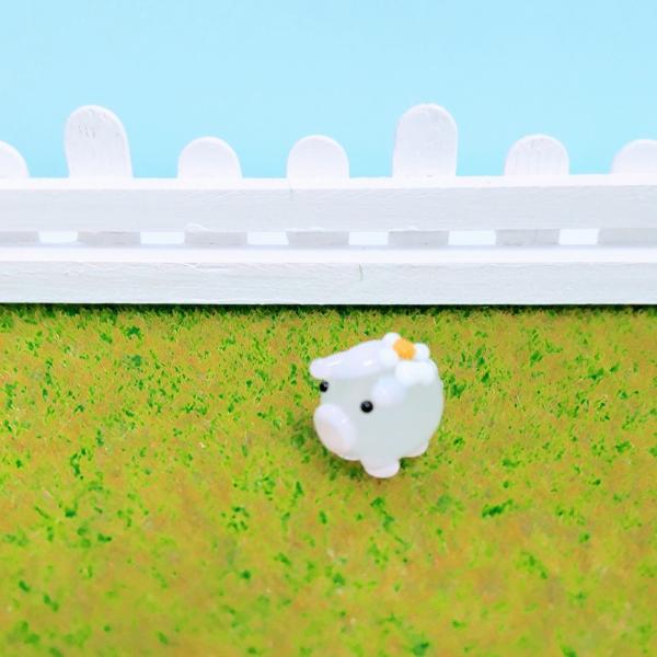 花ぶた（S)ピンクのガラス細工の置物です。【大きさ】約高さ１０ミリ　　横幅１０ミリ　　　　　奥行１０ミリ＊商品は一つ一つ手造りのため大きさや色合いが写真と異なる場合がありますのでご了承をお願い致します。