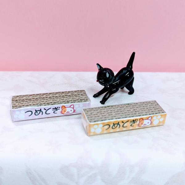 つめとぎ（紙製）2個セットの置物です。【大きさ】約高さ８ミリ　　横幅４８ミリ　　　　　奥行１５ミリ＊商品は一つ一つ手造りのため大きさや色合いなどが写真と異なる場合がありますのでご了承をお願い致します。