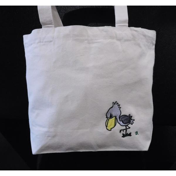 脚を上げるハシビロコウの刺繍入り　キャンバストートバッグSサイズ