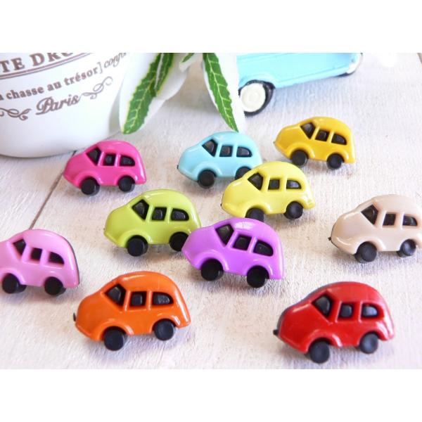 ボタン 車　黒　小　手芸　８個素材：プラスチック【サイズ】１１×１７ｍｍ☆海外輸入品のため、多少作りが雑な場合(色むら、バリ、個体差など）がございますのでご了承ください。