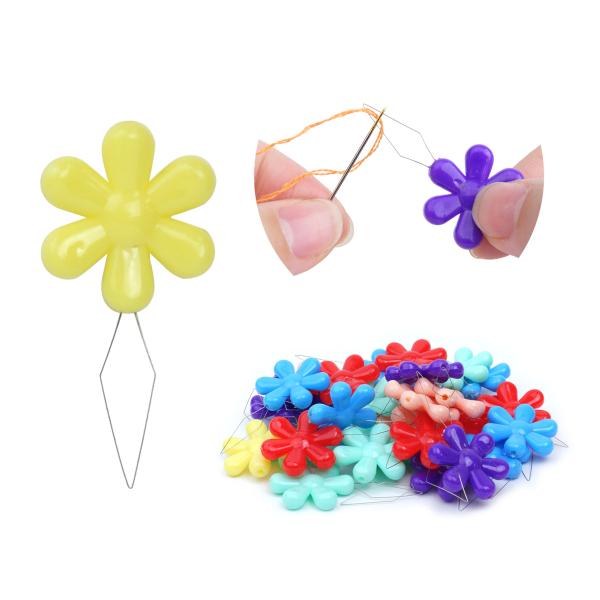 可愛くて使いやすいお花型糸通し針に糸をスムーズに通せるようになりますサッと通せるので時間短縮にも♪先端は丈夫な作りになっているので、様々な糸に対応しています。持ち手部分はかわいいお花モチーフ気分も上がって裁縫がより楽しくなります！掴むのにち...