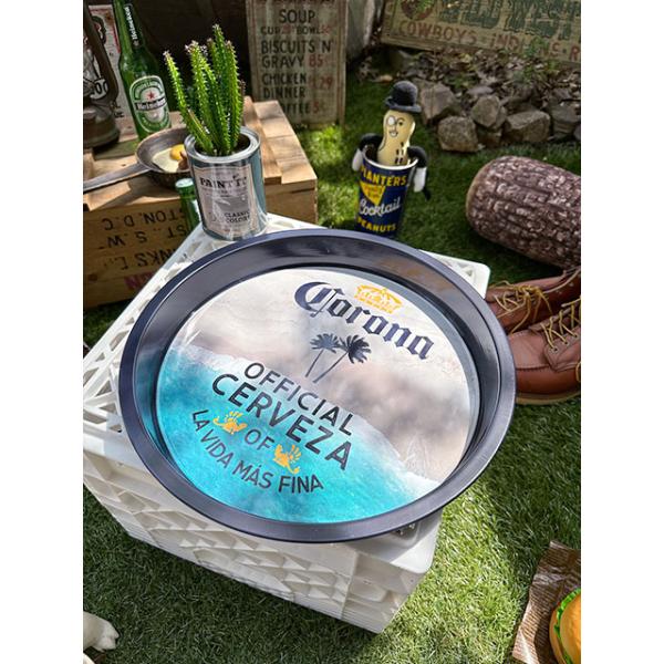 自宅でお酒を楽しむ時、本場のこんなトレイでお酒とおつまみをサーブするだけで、向こうのバーの雰囲気が出るでしょ！コロナの伝統のロゴマークがデザインされた…ブリキ製のパブトレイです。元々はお店で使うために用意されたアイテムなので向こうでもあまり...