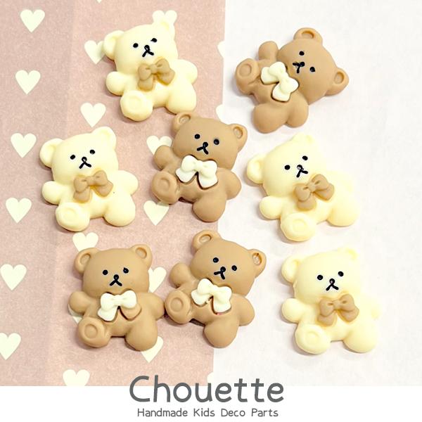 ご覧になって頂きありがとうございます。可愛いリボン付きくまちゃんのデコレーションパーツです！ヘアアクセサリーや小物などにおすすめ♪裏面は平らになっていますので簡単にボンドなどで貼り付けることができます。※目や、リボンなどのインクのにじみや、...