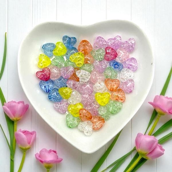 ◆◇ カラフルハート型アクリルビーズ 50個セット ◇◆キラキラ輝くクラック加工入りのハート型アクリルビーズですカラフルな色合いがランダムにミックスされた、とっても可愛い50個入りセット■ おすすめポイント  クラック加工でキラキラ輝く  ...