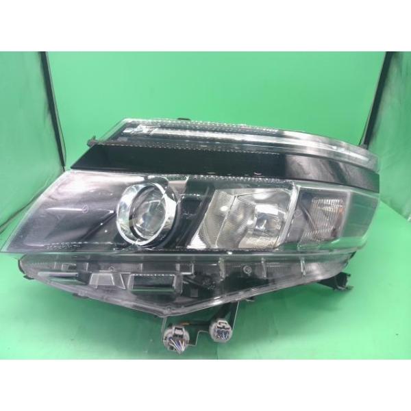 ヴォクシー DBA-ZRR80G 左 ヘッド ランプ ライト 車いすタイプ1 X