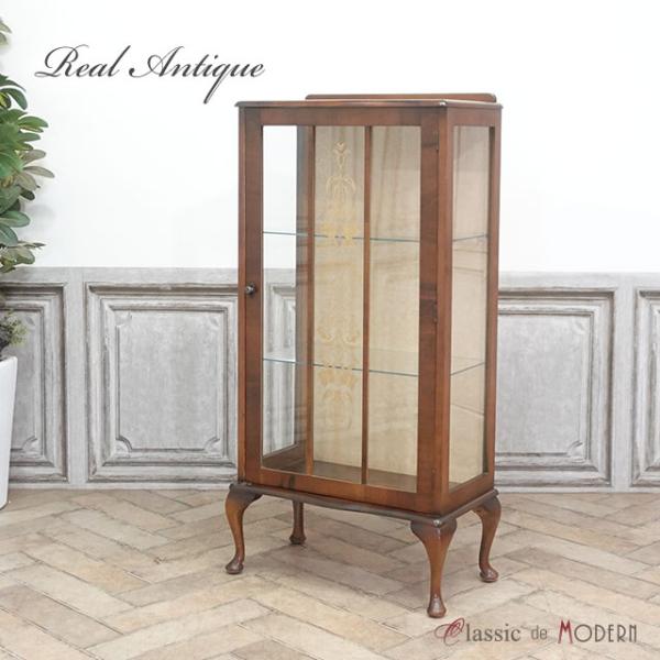 ●品名・品番antique59625　ショーケース　1940年頃　ウォールナット材　イギリス●サイズW 59 x D 32 x H 115 cm●商品について小ぶりなサイズが嬉しいショーケースです。天板の前側が波うったような曲線を描くデザイ...