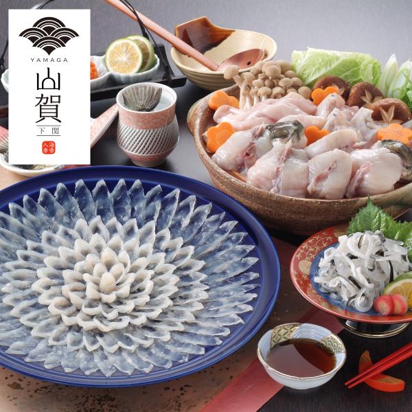 お歳暮父の日 母の日ふぐ刺し・ふぐ料理・とらふぐトラフグの刺身、ちり、鍋、皮刺しと薬味がセットになった贅沢な一品。ふぐ料理山賀の職人の目利きで選んだ身の締まりのいい1ｋｇＵＰサイズの国産トラフグに、山賀社長が自ら包丁 を入れ、身質の確認をし...