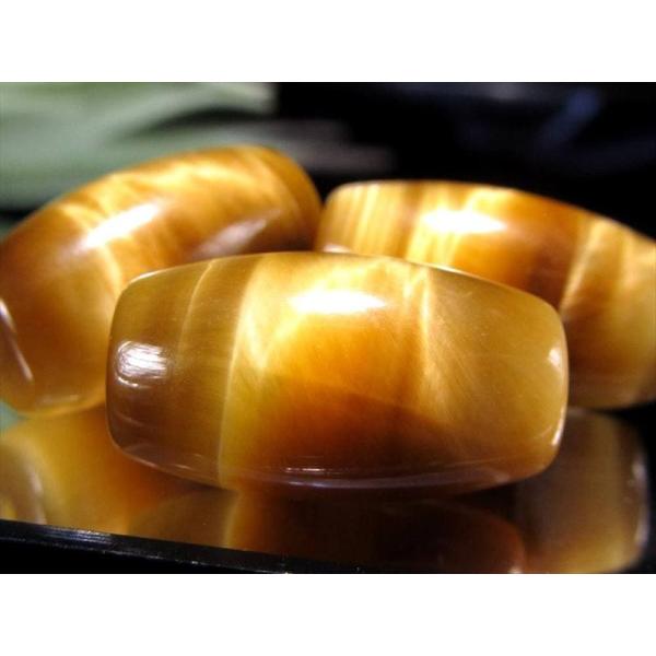 ゴールデン タイガーアイ 天珠型 ビーズ石 1個売り 長さ約18mm-19mm 艶やかな天珠型 幸運を招く聖なる石 黄金色に輝くシャトヤンシー 南アフリカ産