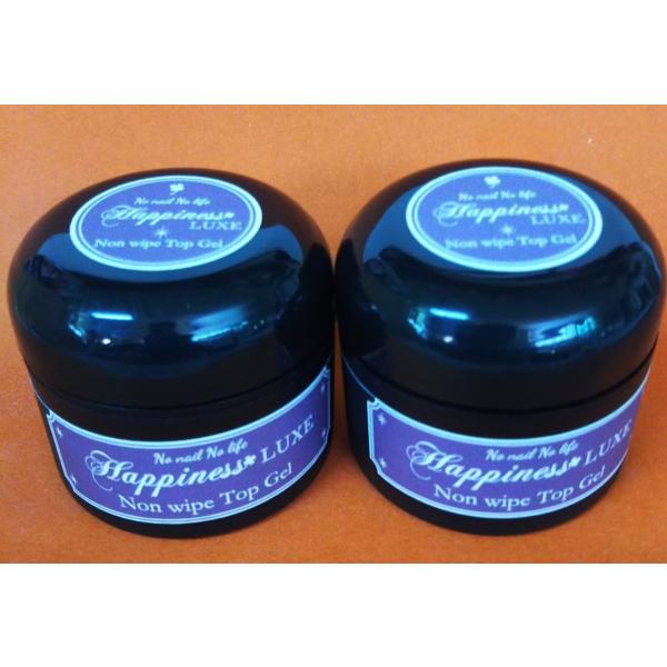 コメント無しでご購入できます。ふき取りのいらないノンワイプ 艶々 トップコートジェル業務用３０ｇ硬さもあり艶々の仕上がりのトップジェル（プロ用） 使いやすさ抜群（適度な硬さ・ストーンやシールの埋め込みも楽々） ノンワイプなので未硬化ジェルの...