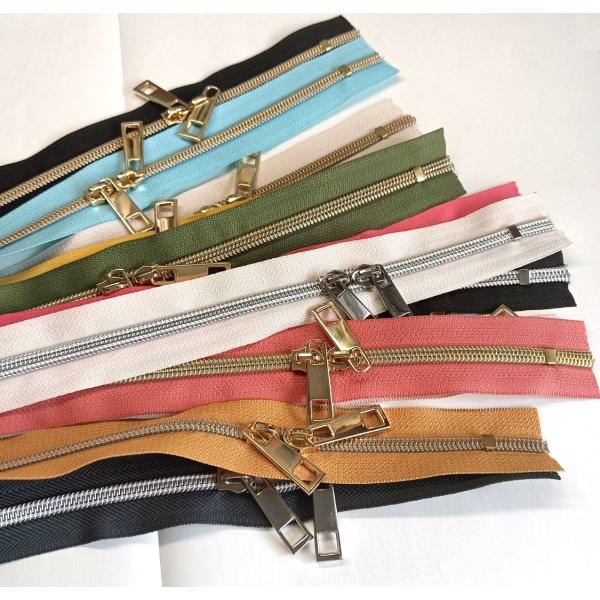 [Release date: April 10, 2025]■40cm■全11色■ファスナー幅約32mmコイルファスナー  テープ部分：ポリエステルエレメント部分カラー：ゴールド/シルバー中国製※20枚まではメール便(200円)で発送いたし...