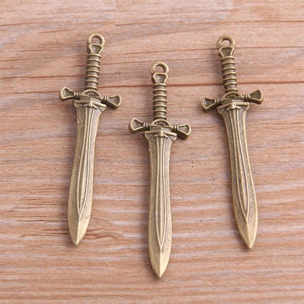 どうのつるぎ☆かわいいアンティークチャーム 銅の剣 金古美 ソード