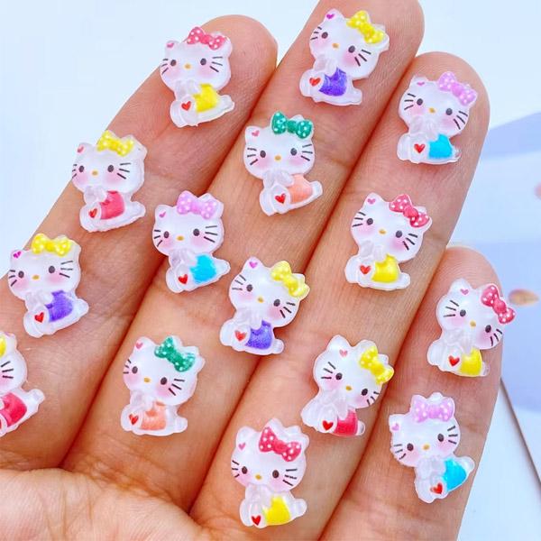 ハートが耳と足に付いたねこちゃんのプラパーツです。とっても小さめでネイルサイズ。もちろんネイル以外にもお使いいただけます♪裏側は空白になっているので、基本的には貼り付けて使うパーツとなります。5色ありまして、それぞれ1色ずつ5個セットでの販...