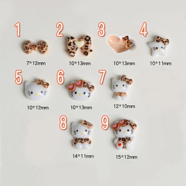 猫とリボンの小さいパーツです！9種類ありますが、共通点はヒョウ柄！とっても小さめでネイルサイズ。もちろんネイル以外にもお使いいただけます♪裏側は空白になっているので、基本的には貼り付けて使うパーツとなります。いずれかの5個セットでの販売とな...