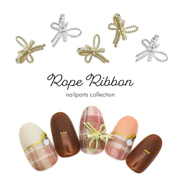 【特徴】存在感抜群！大きめサイズ！ロープを編んだようなリボンパーツ1つ乗せるだけで華やかな印象♪水引のようにも使えて和風ネイルにも合わせやすい！使いやすいゴールドとシルバーの二色展開♪※製造の都合上バリや欠け、くぼみを生じている可能性がござ...
