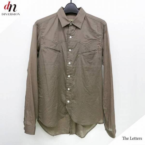 The letters ウエスタンシャツ