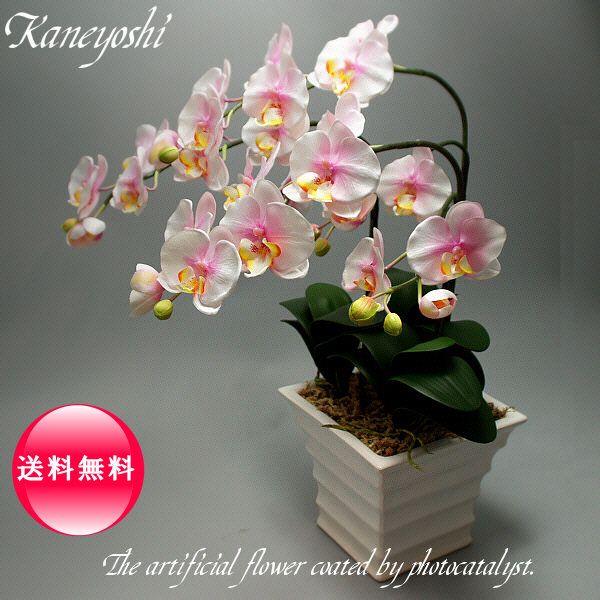 【サイズ】【幅】 約 ５２cm ×【高さ】 約 ６５cm　（鉢の形状によって多少異なる事が有ります。）【花の径】（横） 約 ８．５cm × （縦） 約 ７．５cm胡蝶蘭大輪の造花に光触媒加工が施してあります。 　光触媒作用を持つ二酸化チタン...