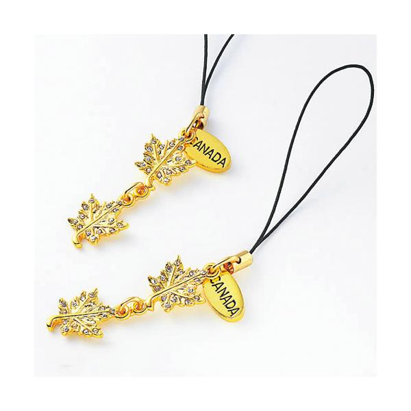 ゴールドのメープルリーフに小さなガラスが散りばめられた、華やかなストラップです。- 1個サイズ：全長約10cm- 原産国：中国製- その他：ビニール袋入（個別包装あり）  ※商品には国内法により日本語の「輸入シール」が貼付されています。（一...