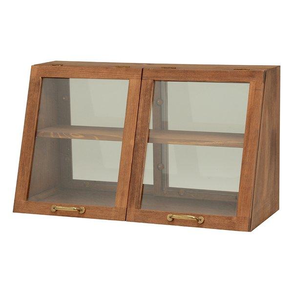 木の風合いが味わい深いカウンター上ガラスケース。表と裏で違う表情を見せる形状でディスプレイとしても活躍します。