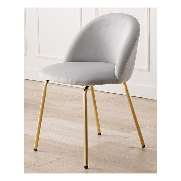 ころんとした座面にゴールドの脚がフェミニンなインテリアチェア背もたれのカーブが背中にフィット