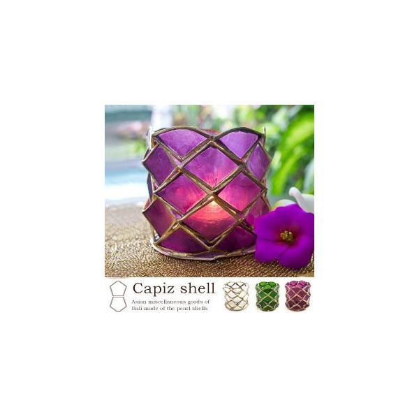 シェルからこぼれる優しい光に癒される、カピスシェルのキャンドルホルダー。光が透けるほど薄く削りった透明感のあるシェルなので、キャンドルを付けると幻想的な光を灯します。天然の貝殻特有の模様と繊細な素材感がとっても素敵なアイテムは、カピスシェル...