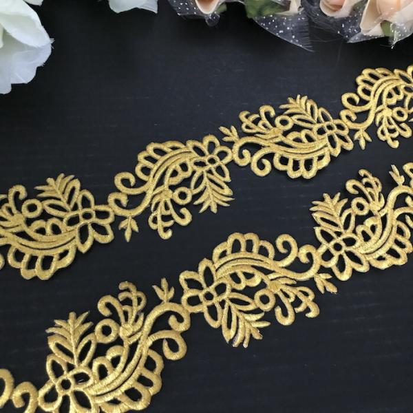 花模様のエレガントなゴールドの刺繍ワッペンモチーフブレードです。切り離してモチーフとしても使用ができます。新体操、社交ダンス、バトントワリング、レオタード、ベリーダンス、フィギュアスケート、バレエ、ドレス、ステージ衣装、ハンドメイド材料など...