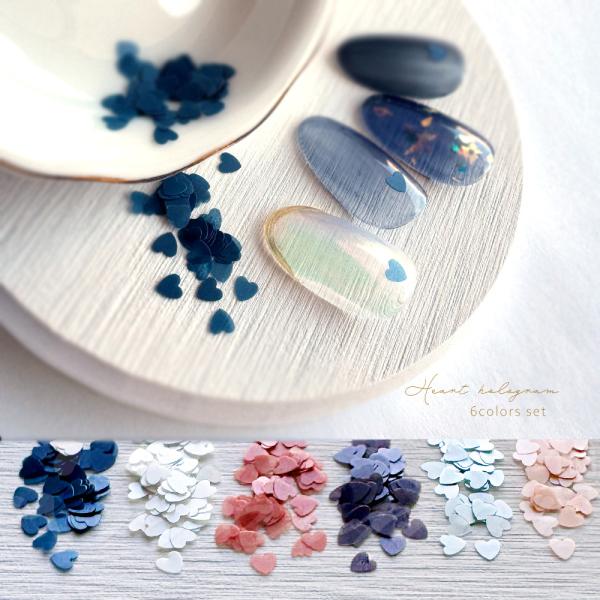 シアーな質感のハートホログラムの6色セットネイルのワンポイントに丁度良いサイズ感！クリスマスやバレンタインにガーリーやオルチャンなデザインにも◎セルフネイル以外でもハンドメイドにおすすめです。サイズ　約２.５ｍｍ×約３ｍｍ【商品について】※...