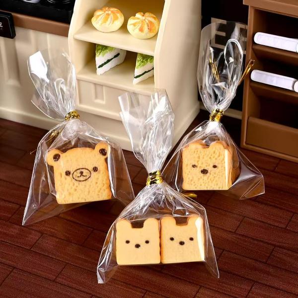 ミニチュアドールハウス 食パンセット 全3種類 ミニチュア ドールハウス 食パン ミニチュア 食品セット パンセット内容数：1セット（3種類）材料：樹脂ミニチュアドールハウス用の食パンセットです。3タイプの食パンから選べます。リアルな見た目...