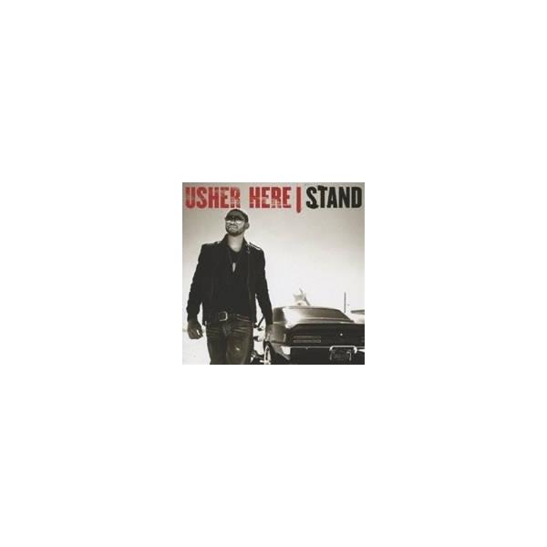 アッシャー／ヒア・アイ・スタンド 【CD】