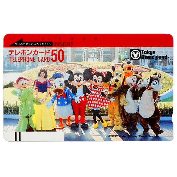 東京ディズニーランド　1986年TDL発行初年度のテレホンカードテレホンカード　50度数メインエントランスにあるミッキー花壇にキャラクター達が集合した写真を使用TDLロゴとシンデレラ城が印刷されたビニール製の2つ折りパスケース型オリジナルケ...