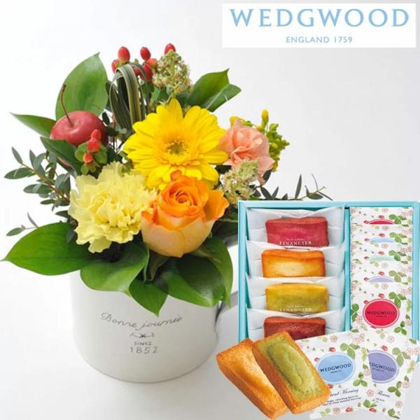 あすつく。送料無料。画像配信有。当店人気のガーベラカップアレンジを銀座千疋屋のバウムクーヘンと共にお届けします。アレンジメントはピンク、イエロー　2色からお選びいただけます。【商品サイズ】ガーベラカップアレンジメント…高さ:約20cm 奥行...