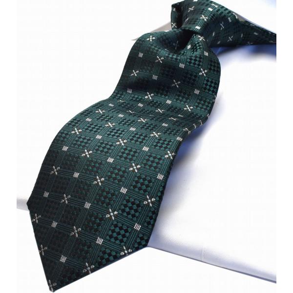 サイズ縦143センチ×幅8〜8.2センチ材　質シルク１００％色グリーン、ブラック、シルバーの格子柄商品説明写真と多少の色の異なりはご了承下さい。 ポイント利用