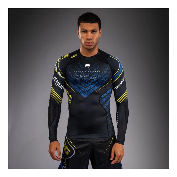 [Release date: January 13, 2026]「拳が運命と交わる」：VENUM x TEKKEN 8は、ミシマ一族の悲劇的な物語と父子の因縁の対決を描く最新作『TEKKEN 8』と共同開発した、本格的な格闘技ギア＆アパレル...