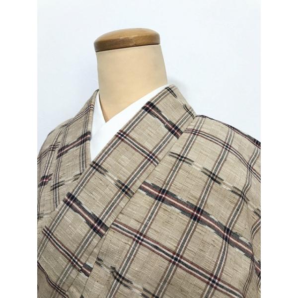 紬着物（絣文）裄67　胴抜き仕立　正絹美品 中古 Mサイズ 絹交織 紬 胴抜き着物 薄茶地に格子文様