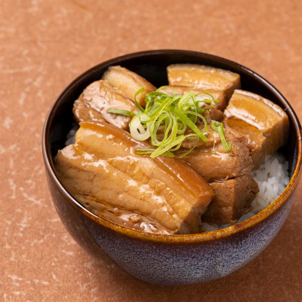 （原材料）豚バラ肉、糖類（砂糖、水あめ）、しょうゆ、食塩水、おろし生姜/調味料（アミノ酸等）、ｐｈ調整剤、増粘剤（キタンサンガム）リン酸塩（Ｎａ）、カラメル色素、（一部に小麦・豚肉・大豆を含む）（内容量）１kg（保存方法）−１８℃以下で保存...