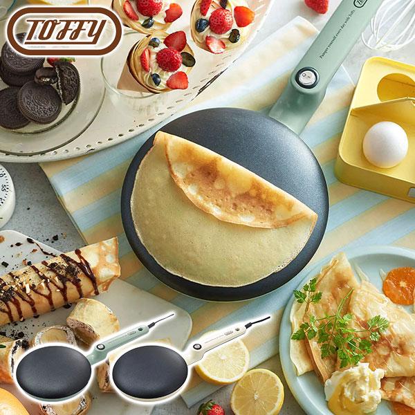 本格的なクレープ作りがお家で簡単に楽しめる♪ご家庭で簡単に本格的なクレープ作りができるクレープメーカー。付属の生地トレイに生地を入れて、プレートを数秒浸すだけで、薄くて均一な厚みの本格的なクレープを焼き上げることができます。カラー展開：PA...