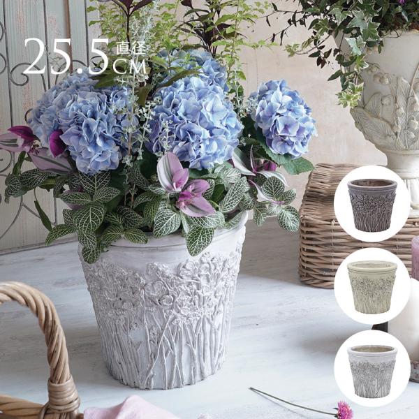 材質:グラスファイバーサイズ/重さ:直径25.5cm×高さ23cm内径：21cm重量：2kg備考:側面にユリを立体的にあしらった、おしゃれなベーシック型プランターです。「リリー」とはユリを意味し、その可憐な花を360度どこから見ても美しいフ...