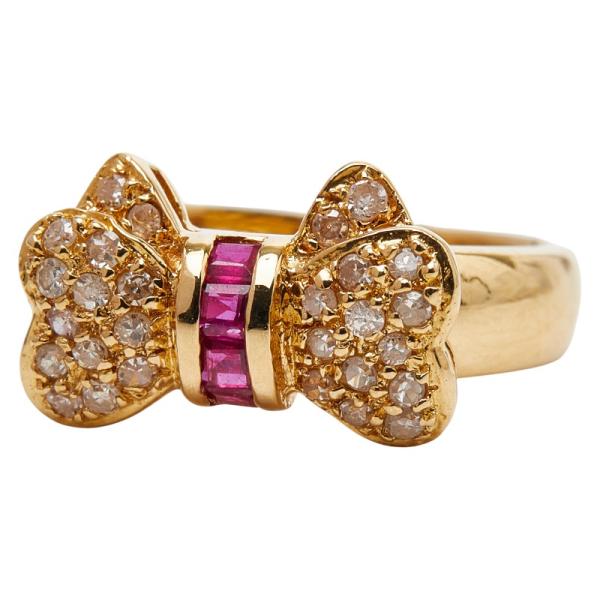K18YG イエローゴールド ルビー0.26ct ダイヤ0.24ct リボン モチーフ
