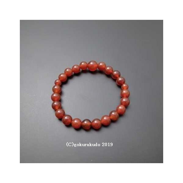 主玉直径：約8.2mm。親玉直径：約10.1mm。2天玉直径：約6.2mm。環全体の内径：約16.2cm。備考：紙箱入全ての玉を赤い瑪瑙（メノウ）で統一した仕様。仏具で単にメノウと云う場合はこの種類の素材を指して居る場合が殆どで、人工的に発...