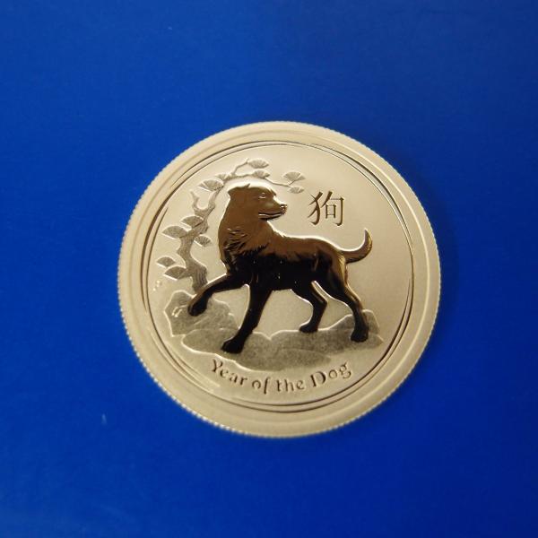 商品名：干支金貨１/2オンス　狗年発行年：２０１８年発　行：オーストラリア　パース造幣局品　位：９９．９9％　純金重　量：１５．５ｇ（１/2オンス）　サイズ：直径　約３０ｍｍ  厚み　約２ｍｍ状　態：新品未使用品　（ミントオリジナルプラケー...