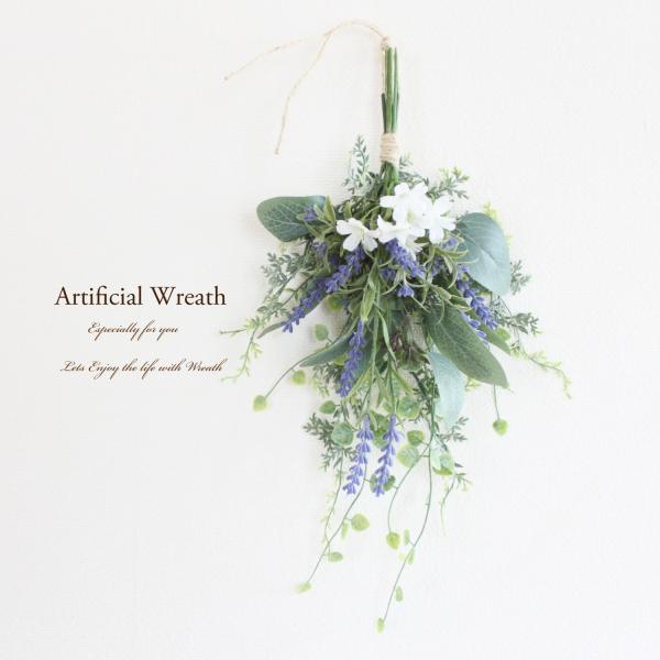 「送料無料」ラベンダーのミニスワッグリース●定形外郵便での発送となります。お届け日の指定は出来ません。封筒に入れた簡易包装でお送りいたします。サイズ　手のひらサイズのミニリースです。結び目からラベンダーの先端まで　約18cm結び目からグリー...