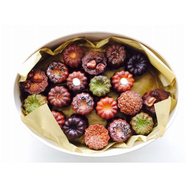 フランス・ボルドー地方の伝統菓子カヌレを、食べやすいプティサイズにしました。 ダニエル定番のプレーン、ショコラ、抹茶などの他、目でも舌でも様々な味を楽しんでいただけるよう、日々、新しい素材を研究しています。ミックス、オーバルの詰め合わせの内...